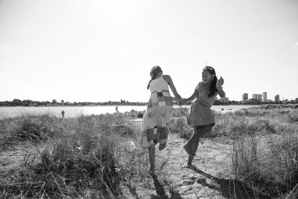 Girls playing. Documentary vacation photography