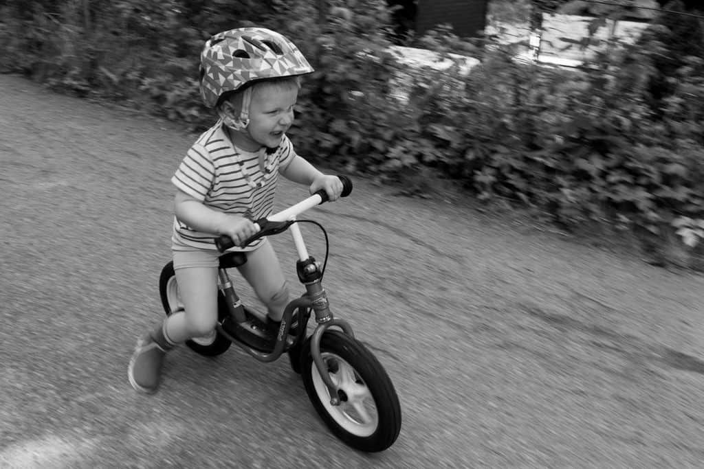 familiefotografering gutt på sykkel